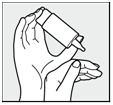 Під час використання підтримуйте контейнер КОМОД іншою рукою, як це показано на малюнку.